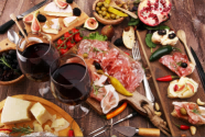 italian-antipasti-wine-snacks-set-cheese-variety-mediterranean-olives-pickles-prosciutto-di